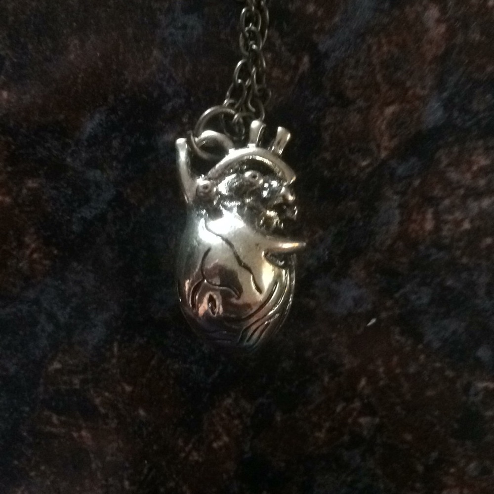 Open cage heart necklace